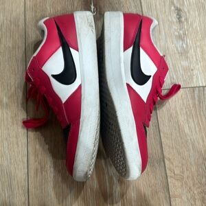 Nike red and white shoes